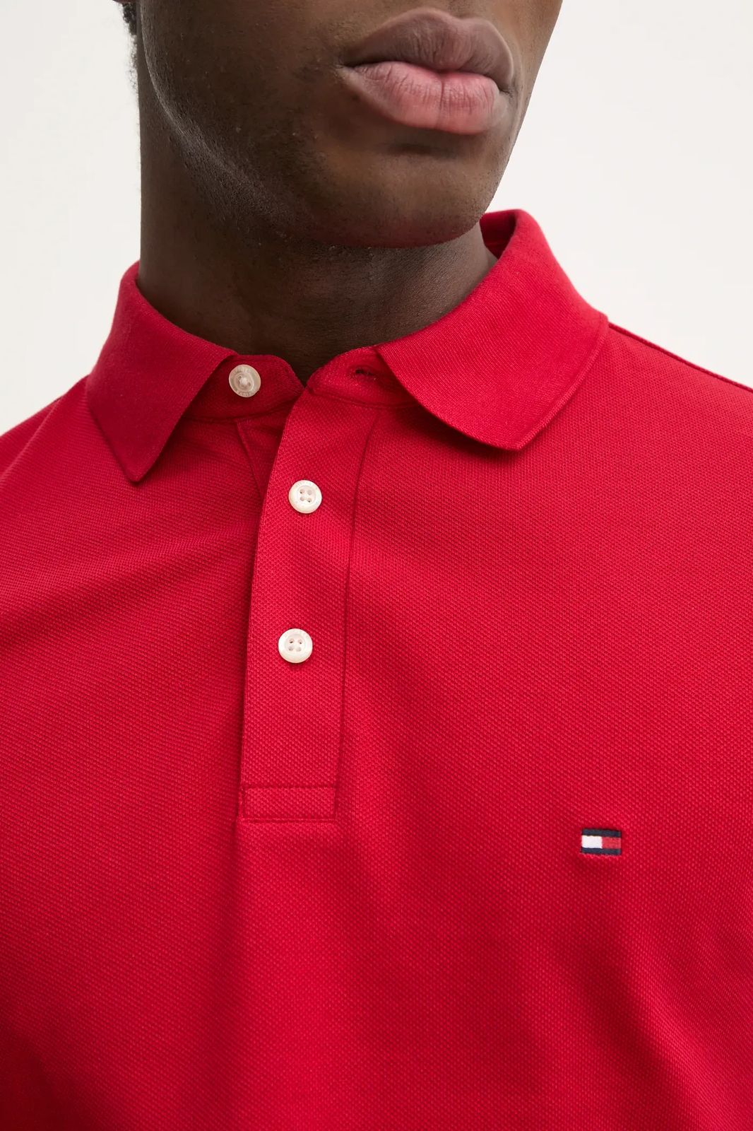 Polo Flag Cuff Slim - Tommy Hilfiger em Algodão Orgânico.